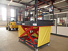 Industrial work platform in the raised position