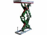 Double scissor lift table fully extended