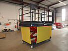 Industrial work platform with PVC roller blind for under-platform protection
